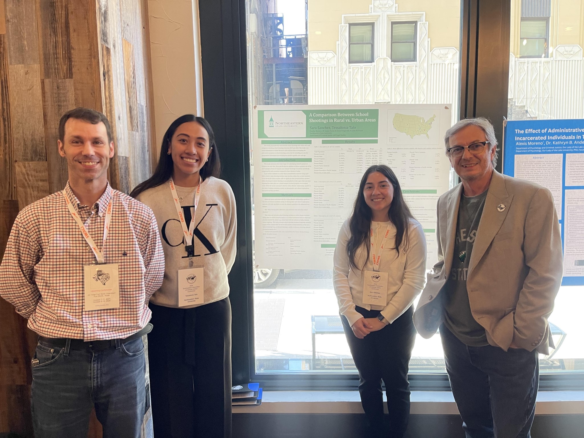 Student Research Poster Presentation Left to right: Dr. James Hurst, Tessalonia Talo, Sara Sanchez, Dr. Brett Fitzgerald