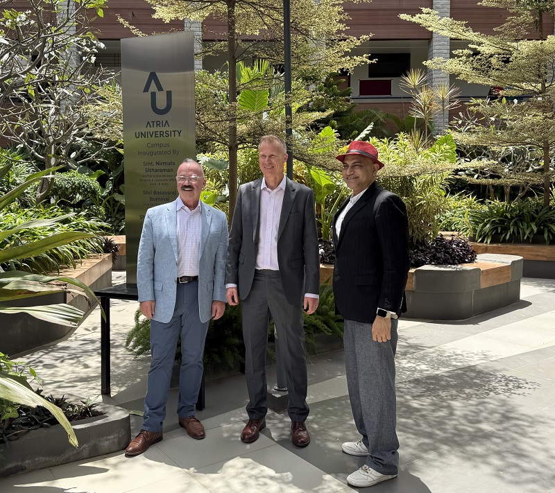 Dr. Jim Ferrell and Dr. Iain Anderson explore the Atria University campus in Bengaluru with CEO Santosh Kanekar.