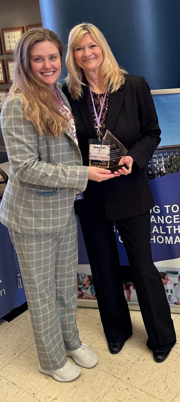 Dr. Doyle receiving award