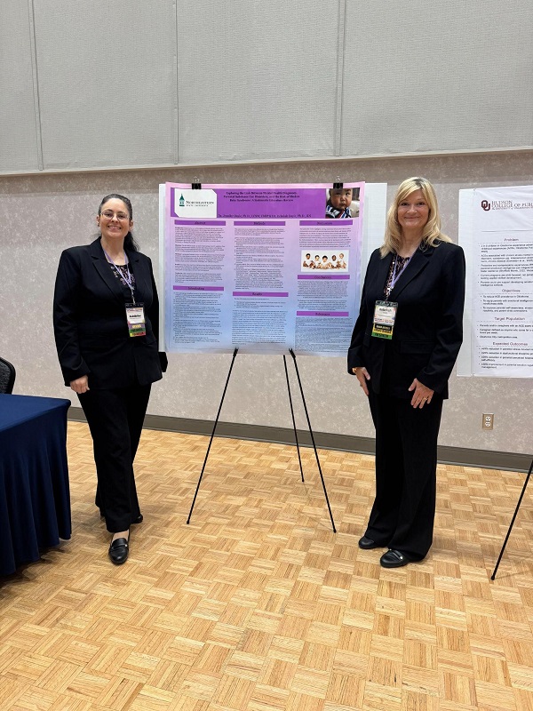 Dr. Doyle and Jennifer Doyle presenting at the OPHA conference.