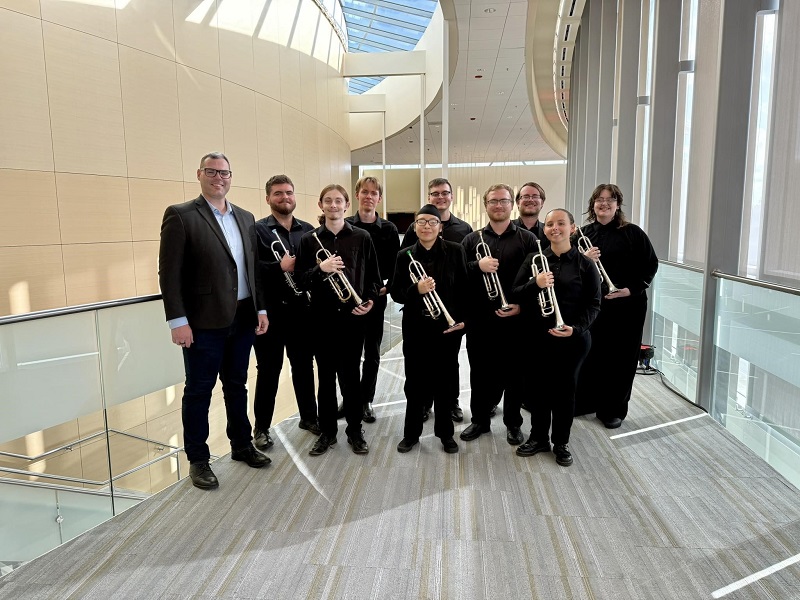 Dr. Hay and students at the festival.