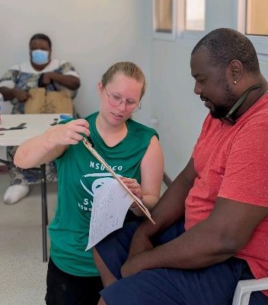 Morgan Miller doing near visual acuities. 