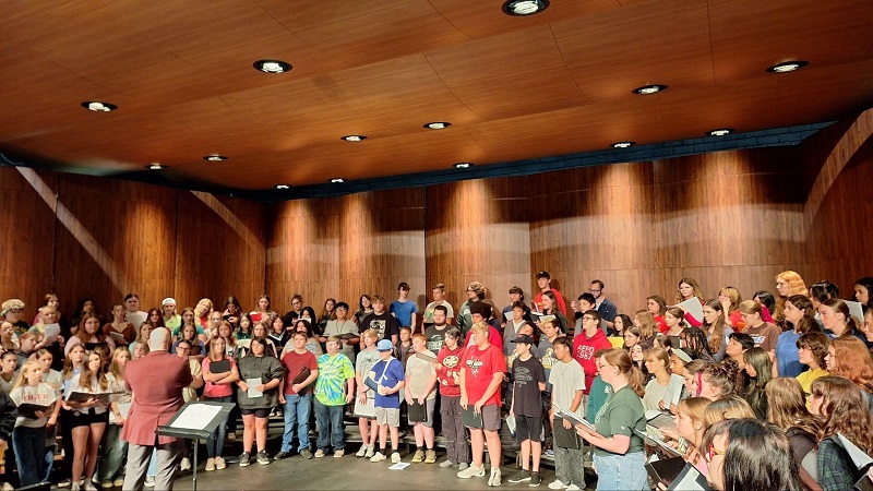 Dr. Wall working with students at the workshop