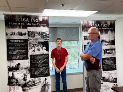 Visitors at the Tulsa Race Massacre Exhibit