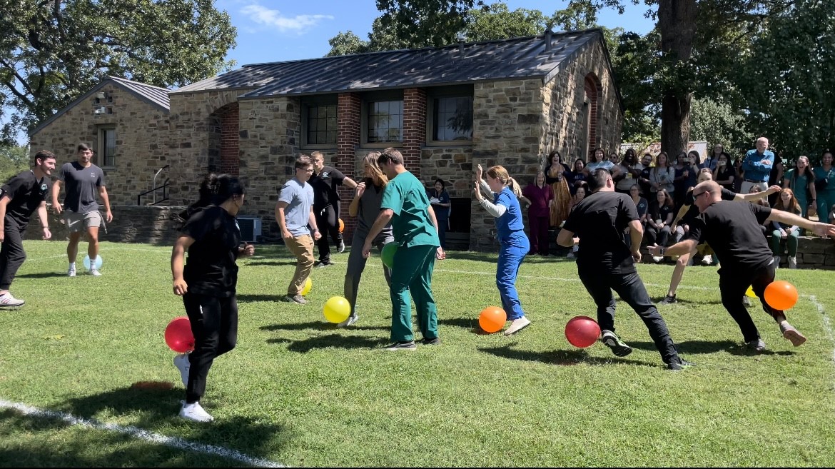 A beautiful day for a balloon stomp game at lunch.