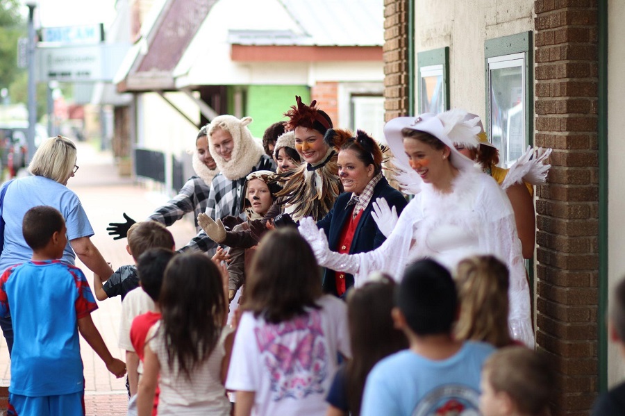 NSU Drama students greeting elementary students after the performance.