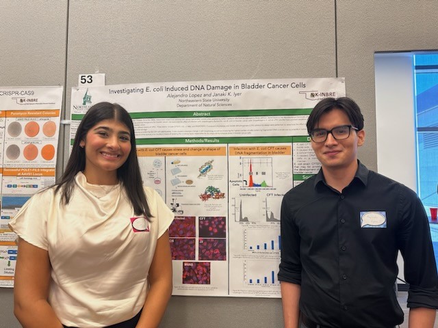 Alejandro Lopez and Tia Tafla presenting their poster at TABERC in July 2024