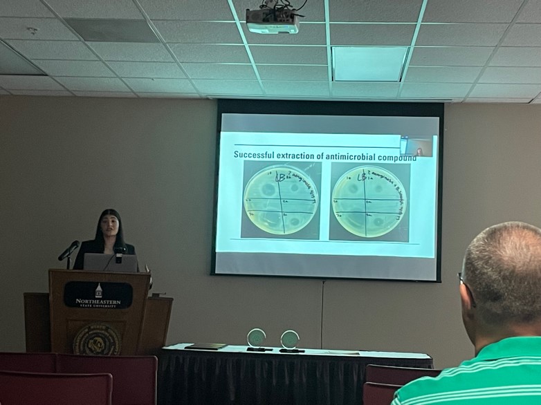 Tia Tafla during her oral presentation at Undergraduate Research Day