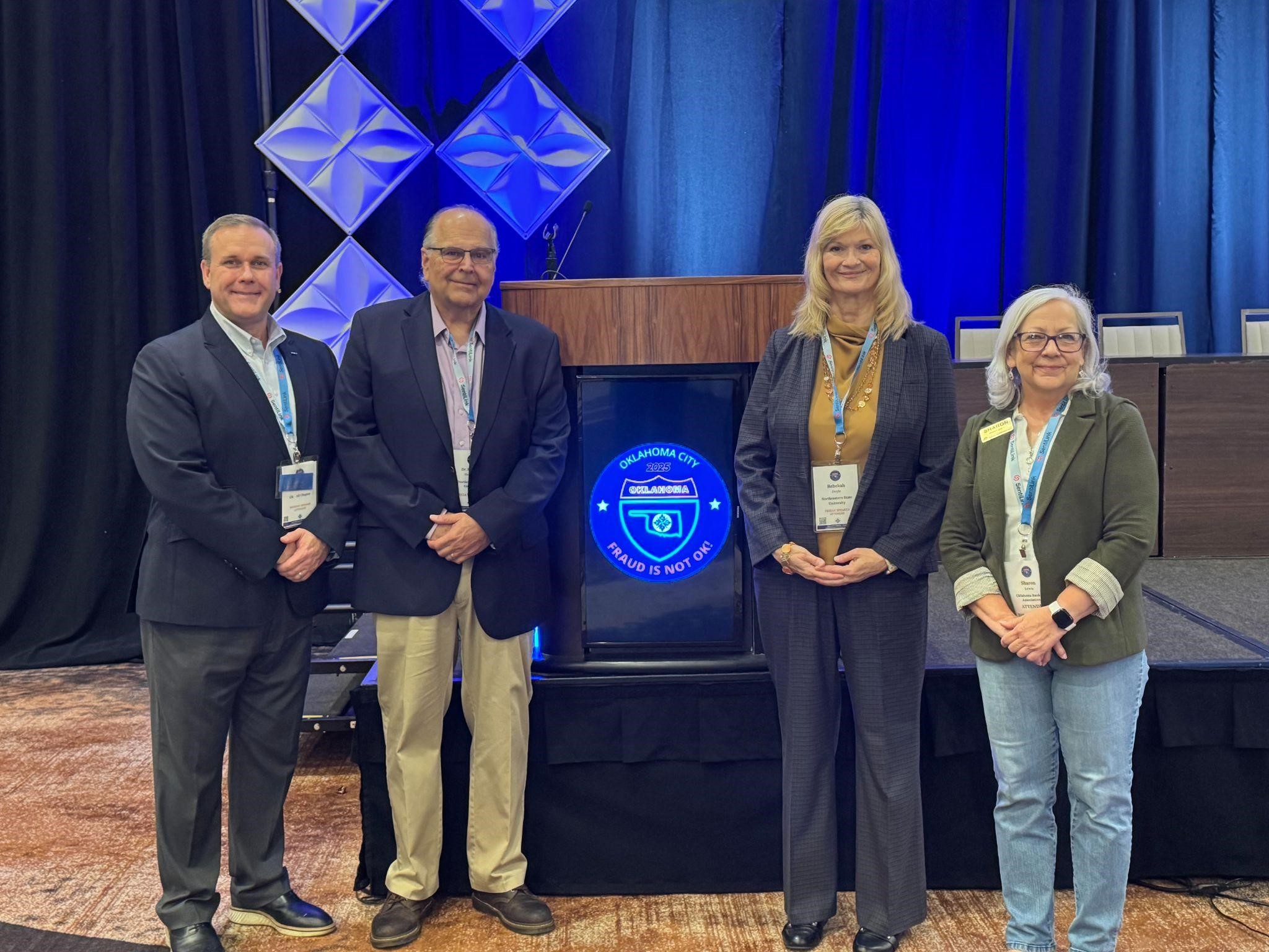 Donald Childers (President, IAFCI- OK-AR Chapter), Dr. Raymond Hasselman, Dr. Rebekah Doyle, and Sharon Lewis (Vice President, Oklahoma Bankers Association- Fraud Division) Donald Childers (President, IAFCI- OK-AR Chapter), Dr. Raymond Hasselman, Dr. Rebekah Doyle, and Sharon Lewis (Vice President, Oklahoma Bankers Association- Fraud Division)