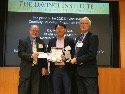 Dr. MooSong Kim with award at 2022 DaVinci Awards Banquet - photo taken by Ken Crowder-